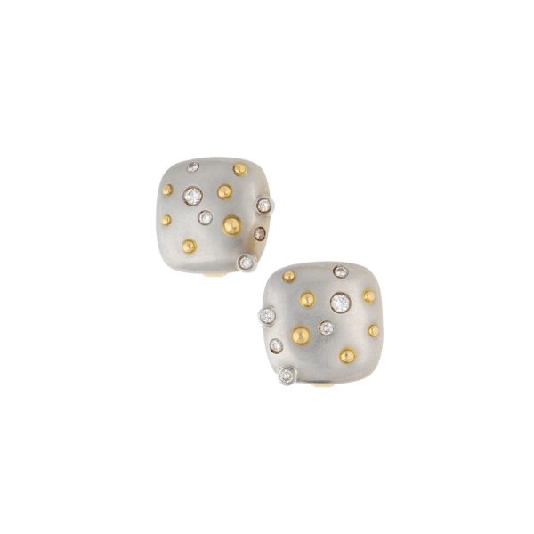 Aretes estilizados con diamantes en platino 950 y oro amarillo 18 kilates. Online now