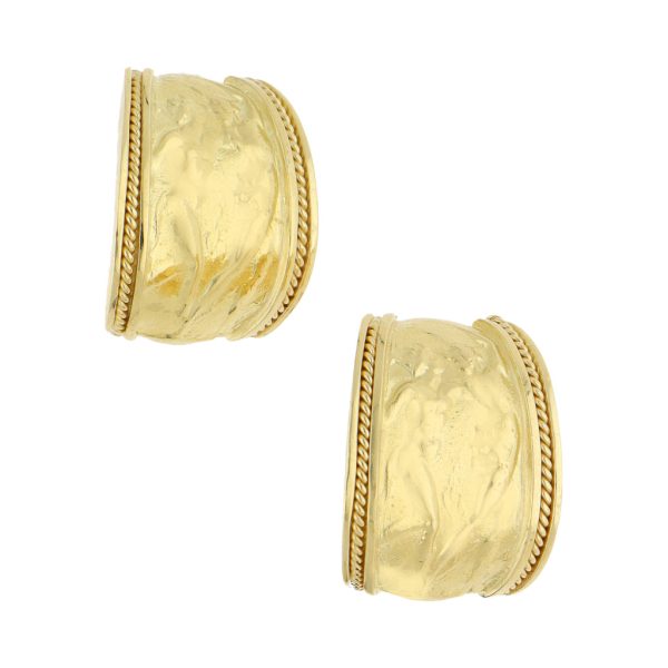 Aretes estilizados en oro amarillo 18 kilates. Fashion