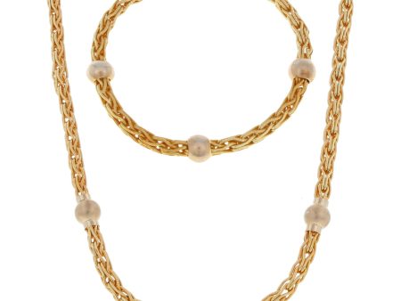 Juego de gargantilla y pulsera eslabón encontrado combinado en oro dos tonos 14 kilates. Online now