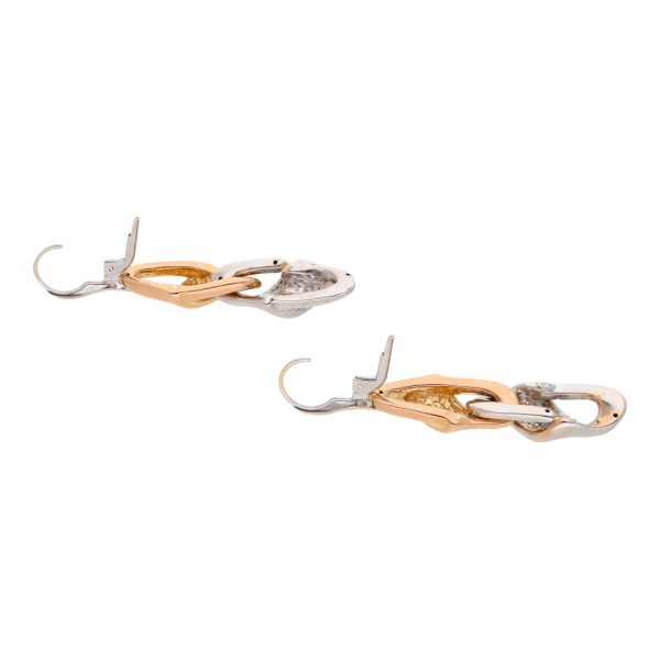 Aretes huecos con colgantes en oro dos tonos 14 kilates. Online now