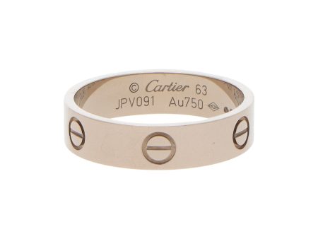 Argolla diseño especial motivo tornillos simulados firma Cartier en oro blanco 18 kilates. Fashion