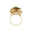 Anillo estilizado motivo floral con diamantes y esmeraldas en oro dos tonos 18 kilates. Online now