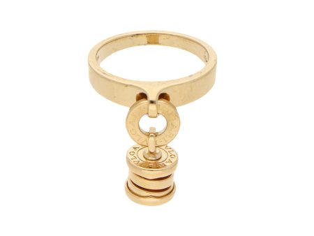 Anillo liso con colgante y diamante firma Bvlgari en oro amarillo 18 kilates. For Discount