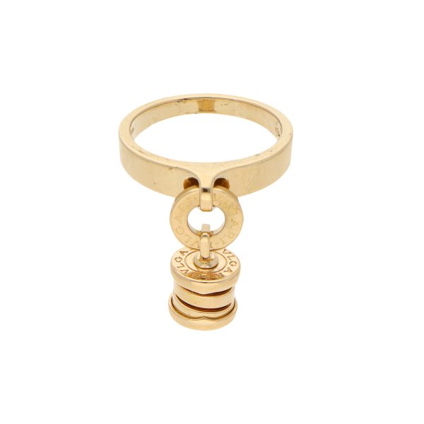 Anillo liso con colgante y diamante firma Bvlgari en oro amarillo 18 kilates. For Discount