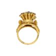 Anillo estilizado con esmeraldas, rubíes y zafiros en oro amarillo 22 kilates. For Discount