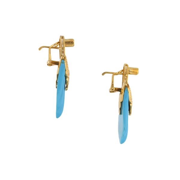 Aretes estilizados con diamantes y sintéticos en oro amarillo 14 kilates. Discount