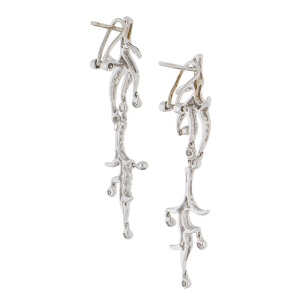 Aretes estilizados con colgantes y diamantes en oro blanco 14 kilates. Hot on Sale