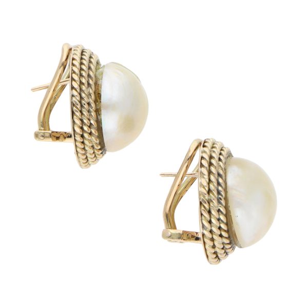 Aretes estilizados con perlas en oro amarillo 10 kilates. Online