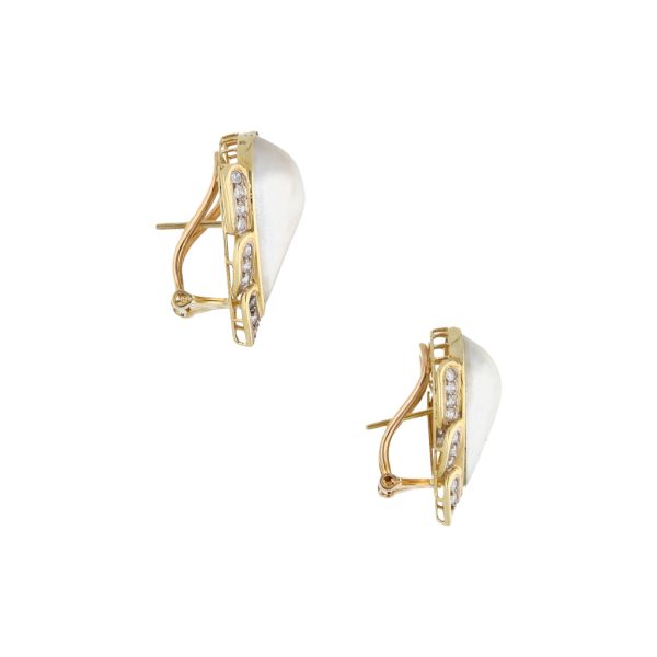 Aretes estilizados con diamantes y perlas en oro amarillo 14 kilates. For Discount