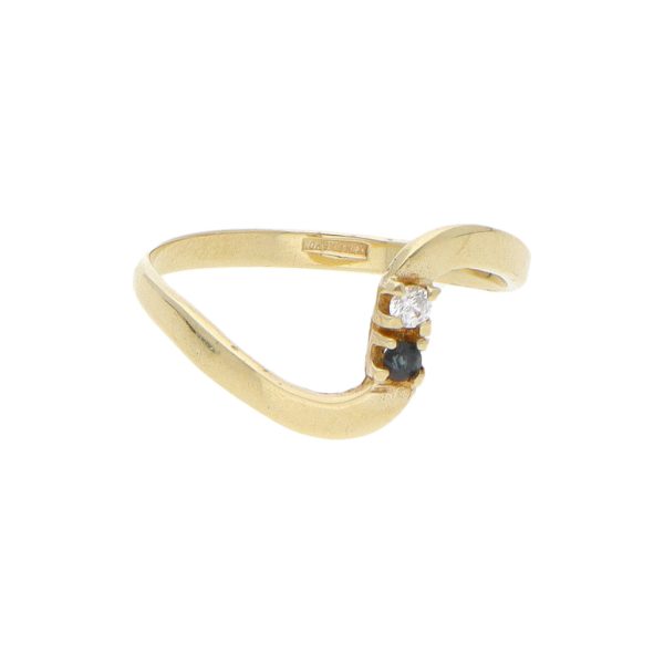 Anillo ondulado con sintéticos en oro amarillo 10 kilates. Discount