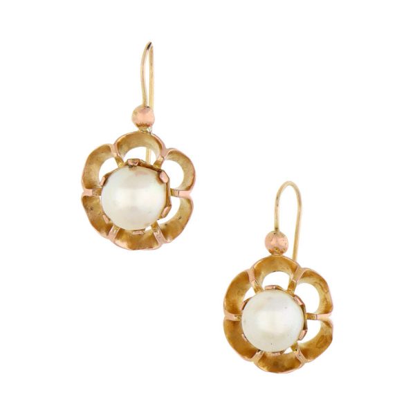 Aretes diseño especial con perlas en oro amarillo 10 kilates. Fashion