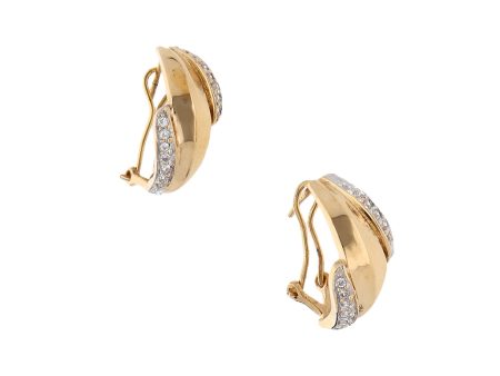 Aretes estilizados con circonias en oro amarillo 14 kilates. Supply