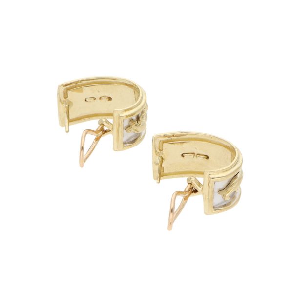 Aretes estilizados motivo felino en oro amarillo 14 kilates. Online Hot Sale