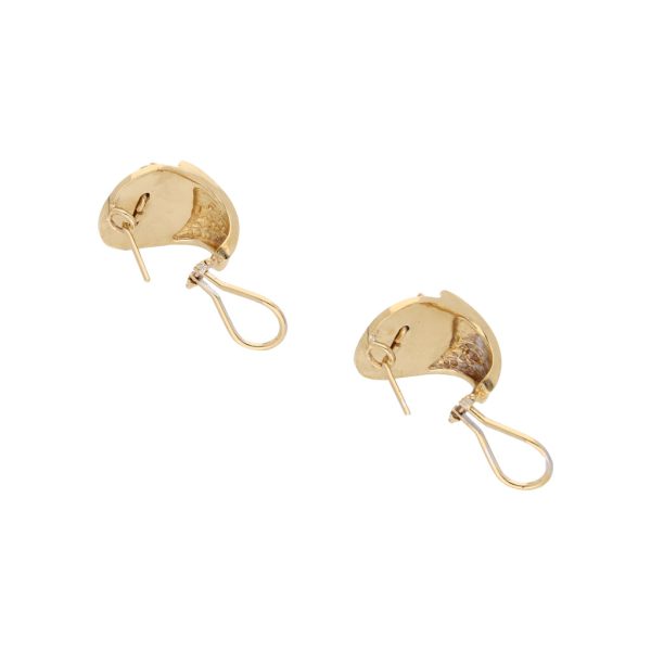 Aretes diseño especial motivo felino en oro amarillo 14 kilates. Supply