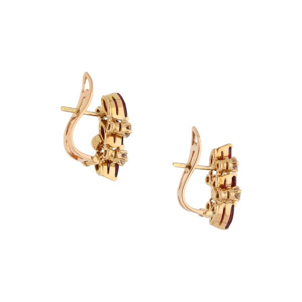 Aretes estilizados con diamantes y rubíes en oro amarillo 18 kilates. Online Hot Sale