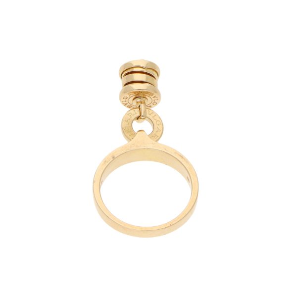 Anillo liso con colgante y diamante firma Bvlgari en oro amarillo 18 kilates. For Discount