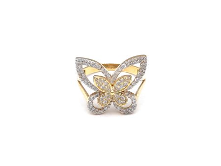 Anillo estilizado motivo mariposa con circonias en oro amarillo 14 kilates. Fashion