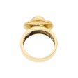 Anillo estilizado motivo floral y corazón con sintético en oro amarillo 18 kilates. For Discount