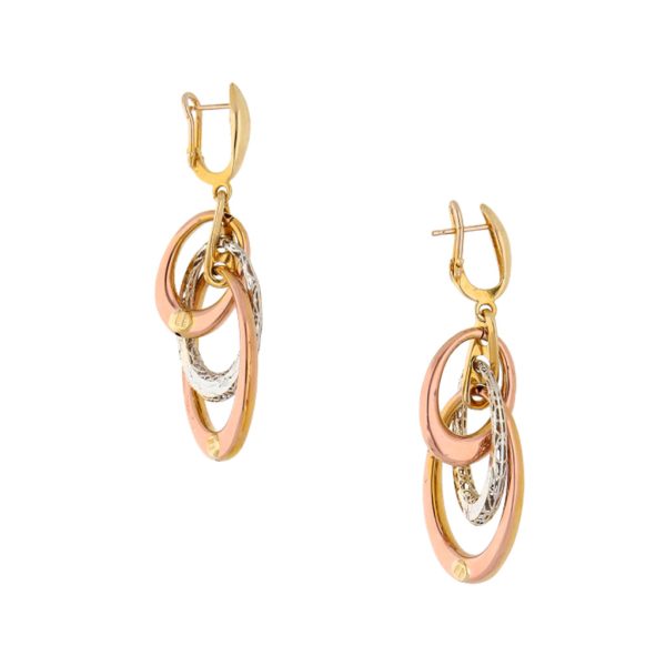 Aretes estilizados en oro tres tonos 14 kilates. Online now