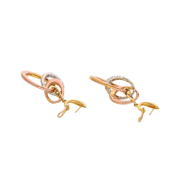 Aretes estilizados en oro tres tonos 14 kilates. Online now