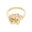 Anillo estilizado motivo floral con circonias en oro amarillo 14 kilates. Discount