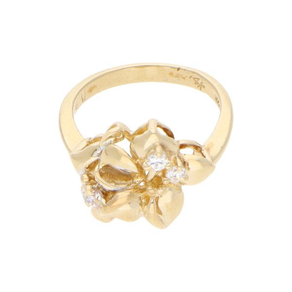 Anillo estilizado motivo floral con circonias en oro amarillo 14 kilates. Discount