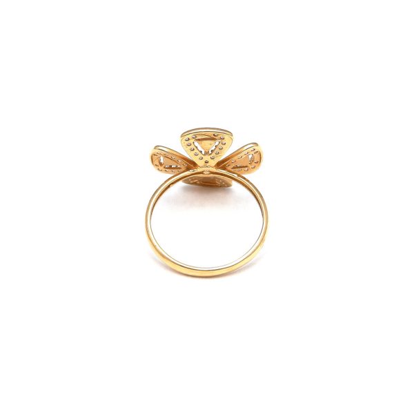 Anillo estilizado motivo trébol con circonias en oro amarillo 14 kilates. Cheap