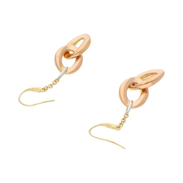 Aretes huecos con colgantes firma Chimento en oro tres tonos 18 kilates. Fashion