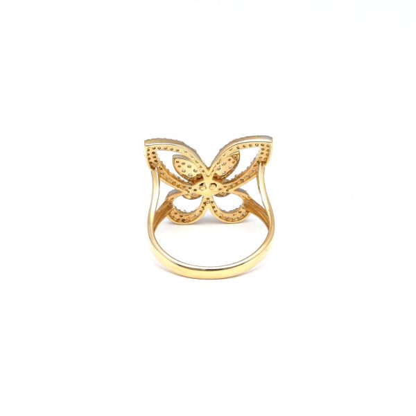 Anillo estilizado motivo mariposa con circonias en oro amarillo 14 kilates. Fashion