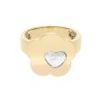 Anillo estilizado motivo floral y corazón con sintético en oro amarillo 18 kilates. For Discount