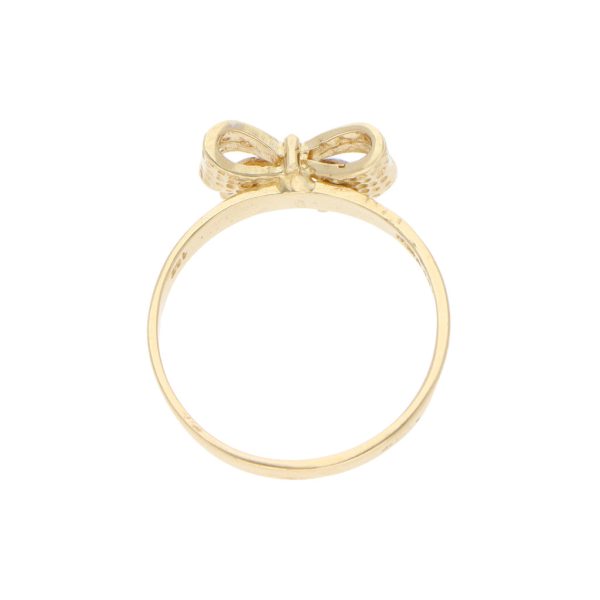 Anillo estilizado motivo moño con circonias en oro amarillo 14 kilates. Cheap