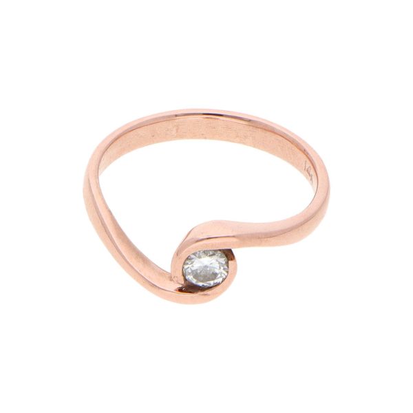 Anillo ondulado con diamante en oro rosa 14 kilates. Online now