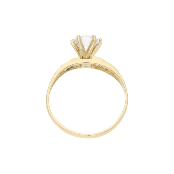 Anillo liso con circonias en oro amarillo 10 kilates. Online now