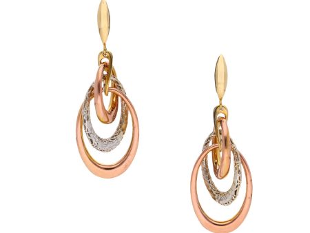 Aretes estilizados en oro tres tonos 14 kilates. Online now